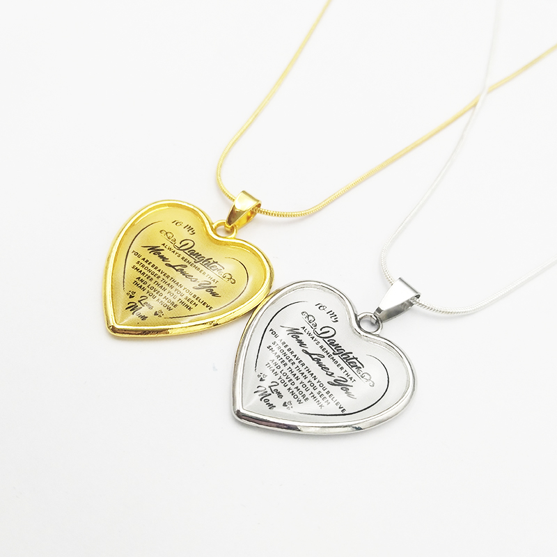 mom to daughter engraved "mom loves you" heart-shape epoxy necklace