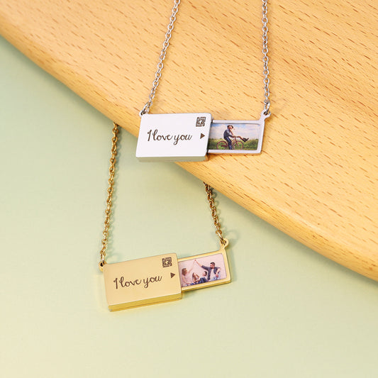 letter-shaped necklace with a personalized photo inside