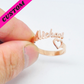 personalized ring with a name and a little heart rose gold
